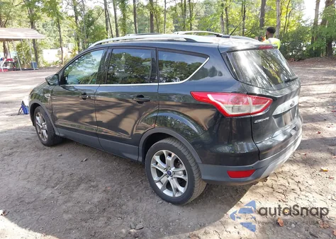 2014 Ford Escape Titanium z USA, uszkodzony, nr VIN 1FMCU9JX5EUD56425